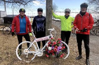 Doug Kennedy (left) with members of his riding club at 'the ghost bike' memorial for 'wheelman' Jeff Vervaike